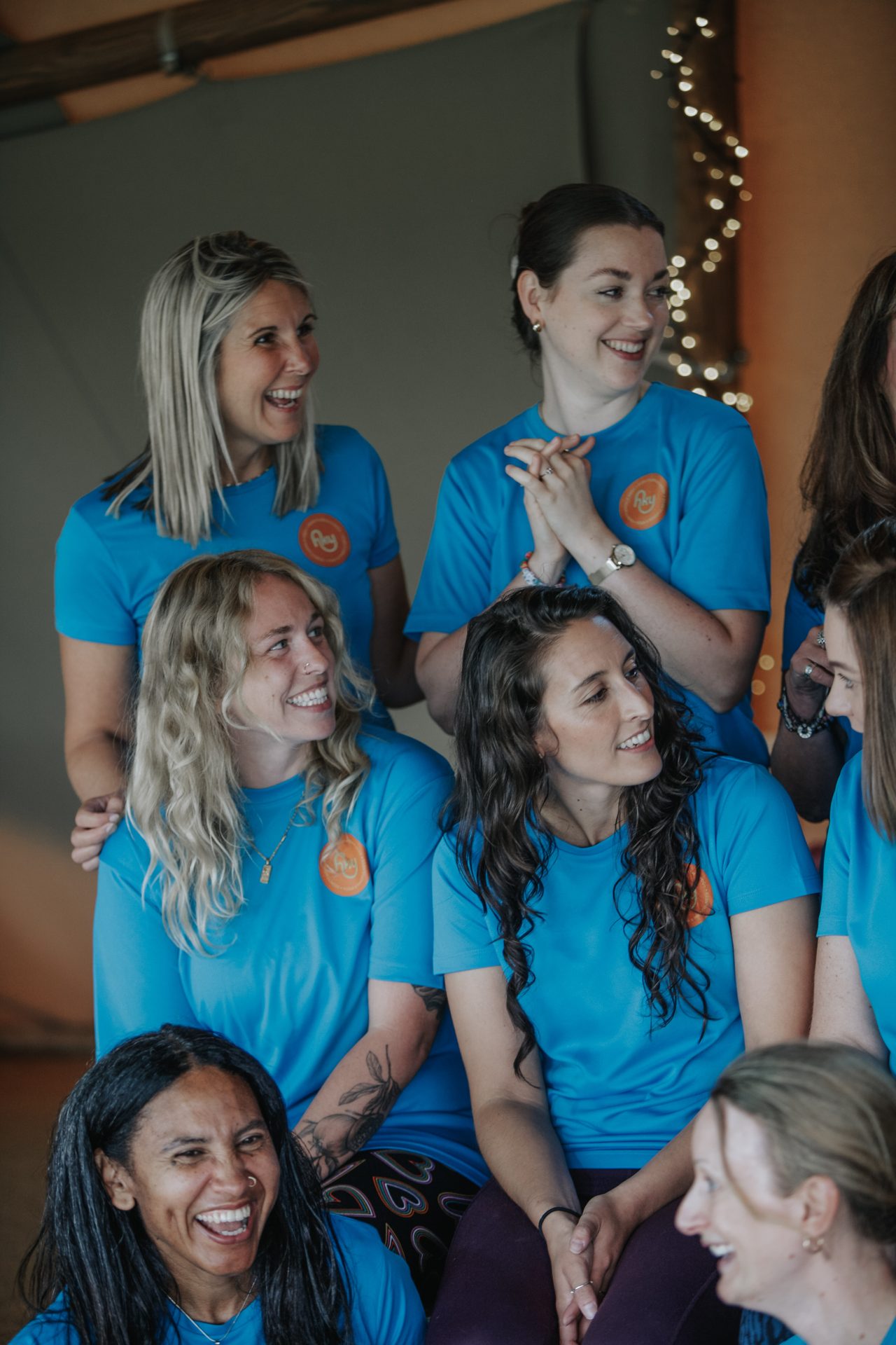 Happy Kids Yoga franchisees laughing together