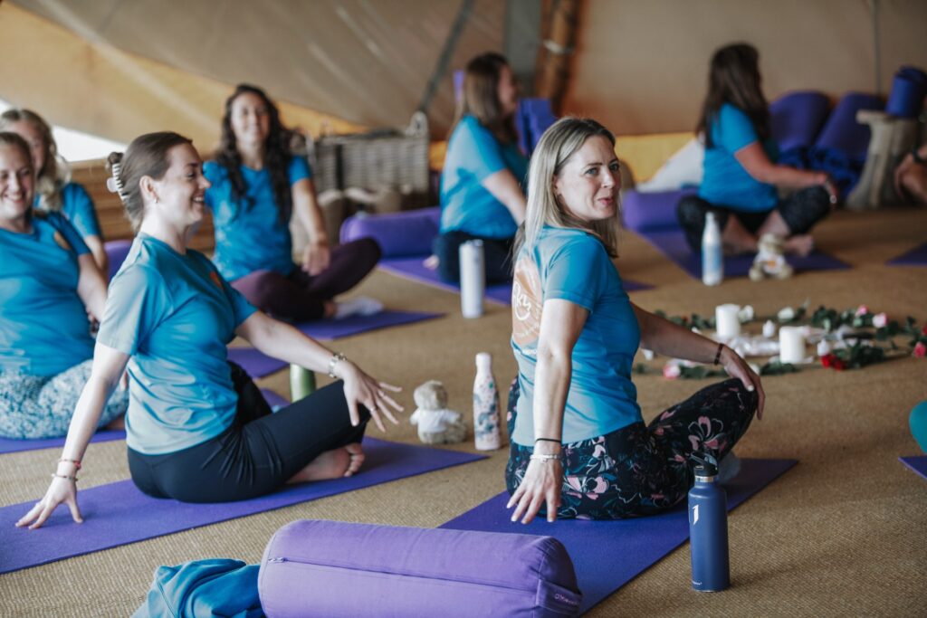 Happy Kids Yoga franchisees practising on their mats