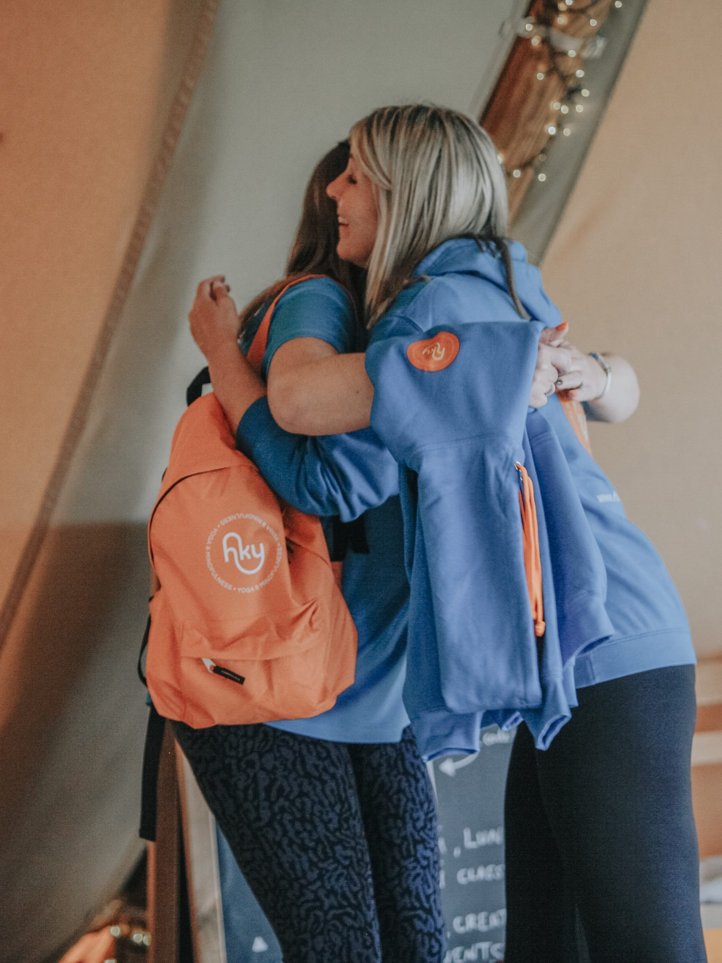 Happy Kids Yoga franchisee with the orange kit backpack